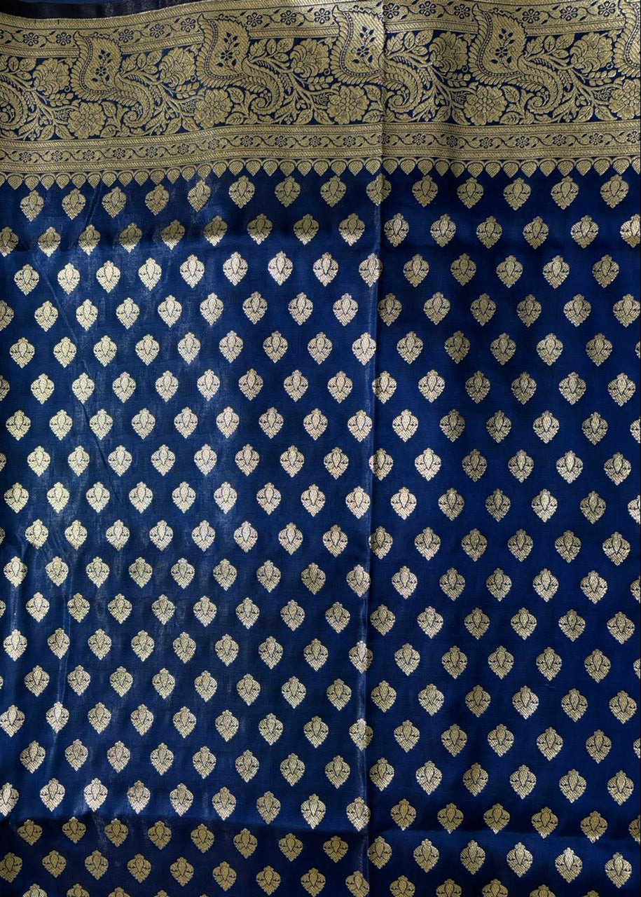Beautiful border of a navy blue banarasi silk saree in golden zari work 