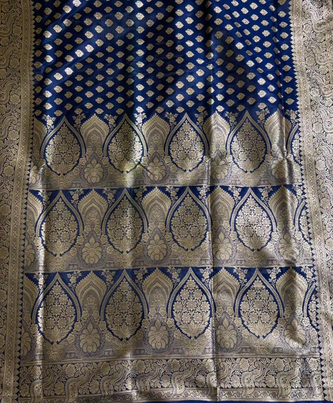 Beautiful pallu in intricate golden zari work in a navy blue banarai Silk Saree