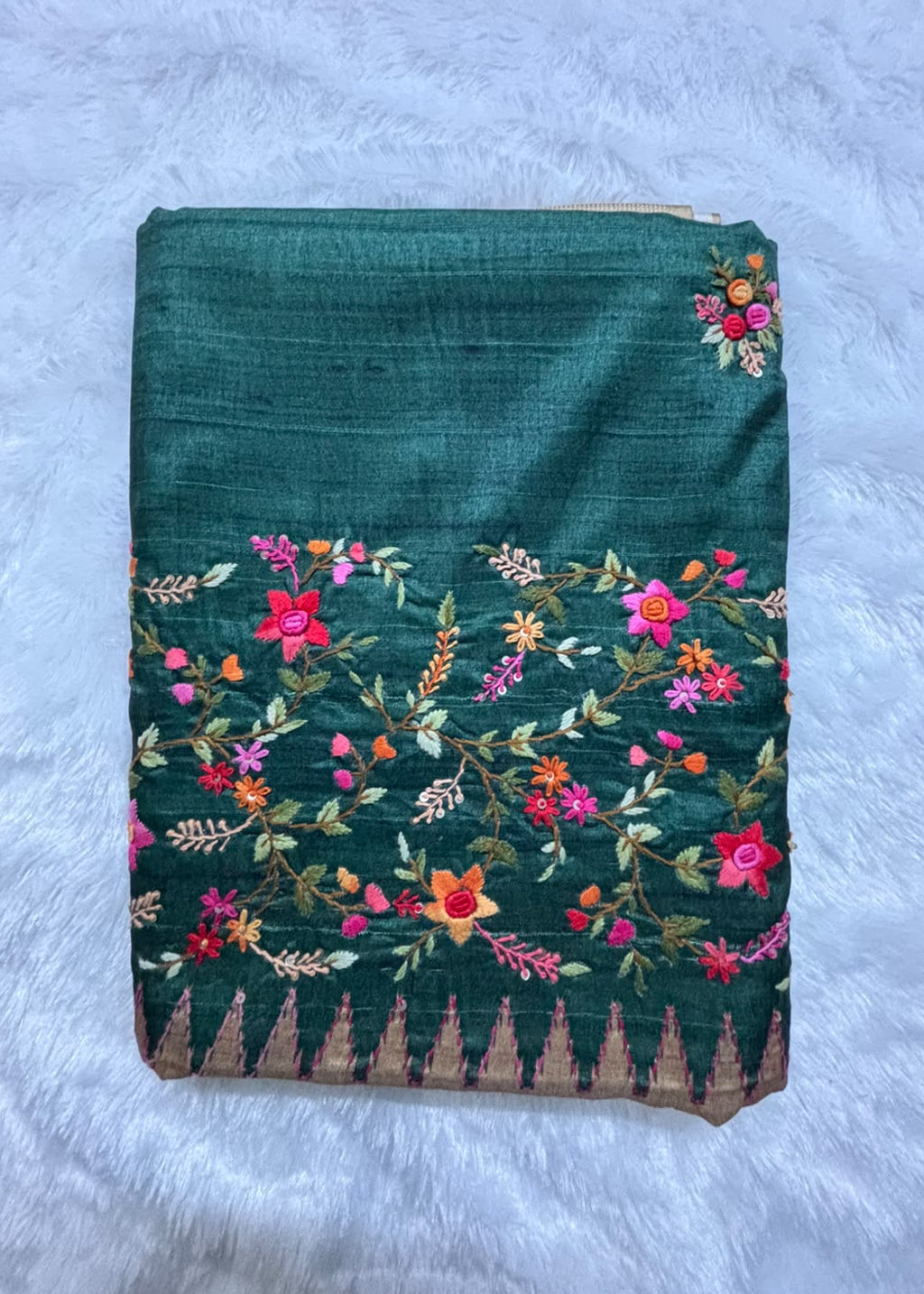 Colourful floral butta Kantha embroidery on bottle green saree body