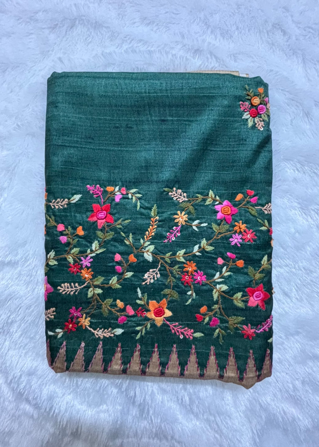Colourful floral butta Kantha embroidery on bottle green saree body