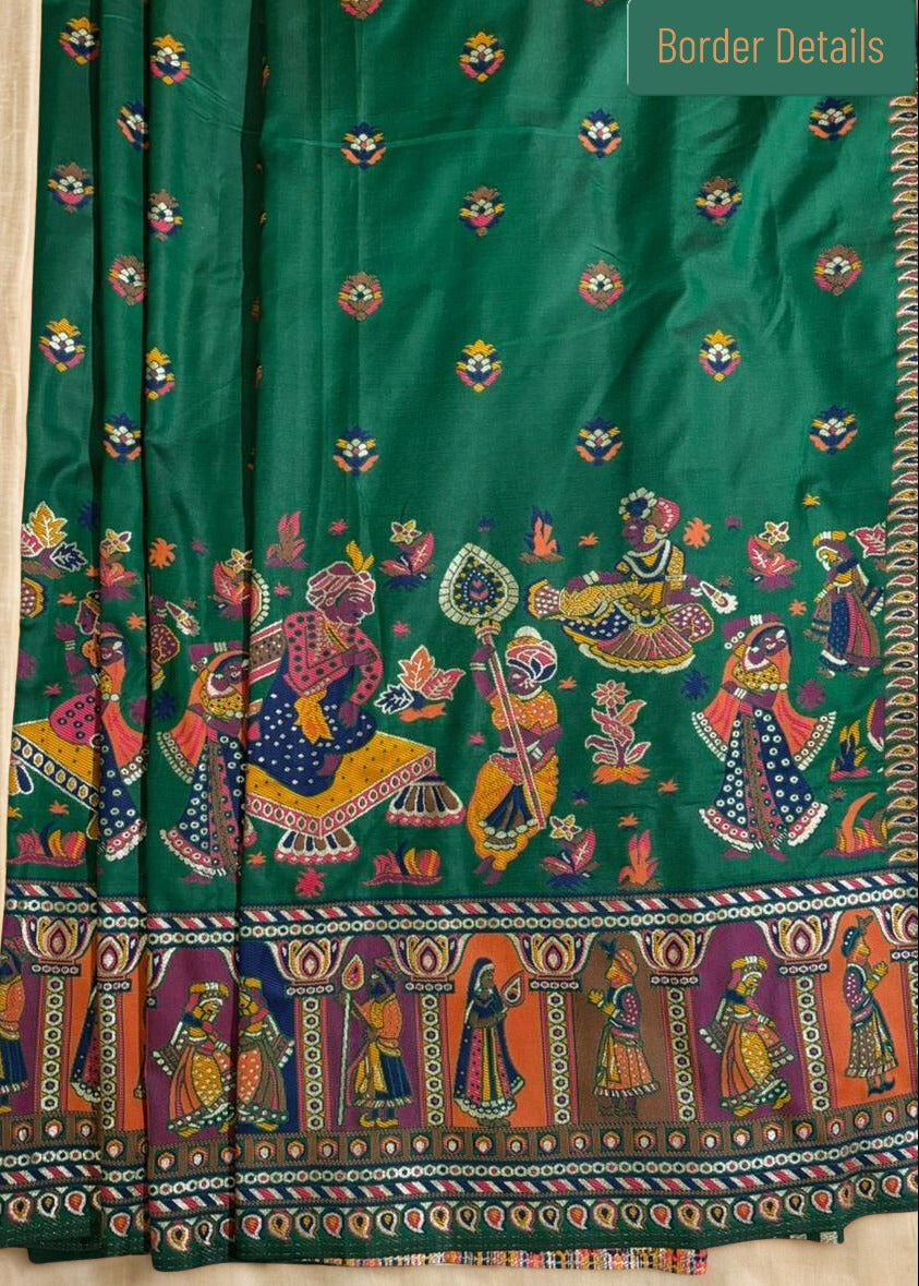 Green  silk Baluchari Saree with colorful traditional patterns on a beige background