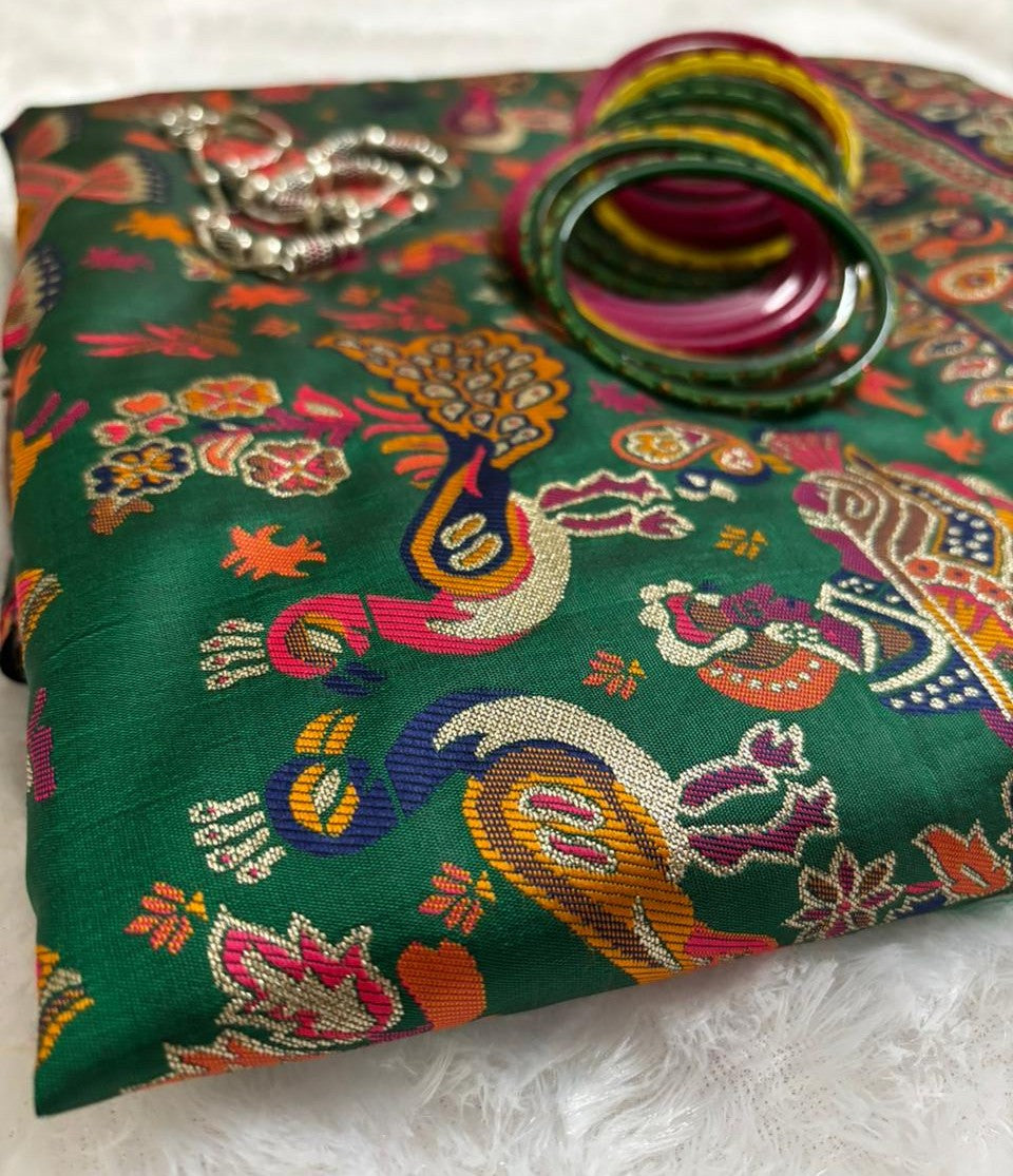 Beautiful Green Mayurkatha Balucharii Saree with white feather texture background