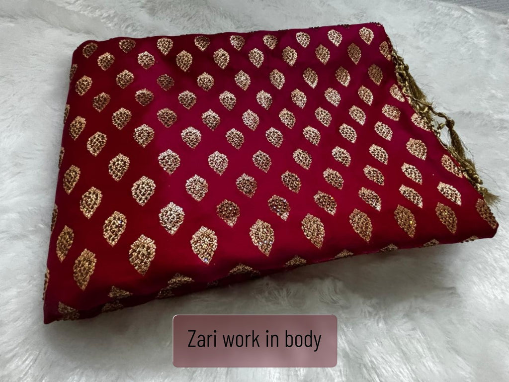 Red pure silk Banarasi saree flat lay showing full paisley motif and gold zari border
