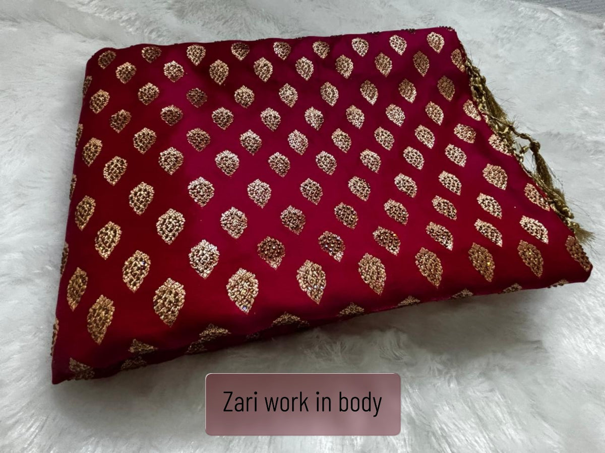 Red pure silk Banarasi saree flat lay showing full paisley motif and gold zari border
