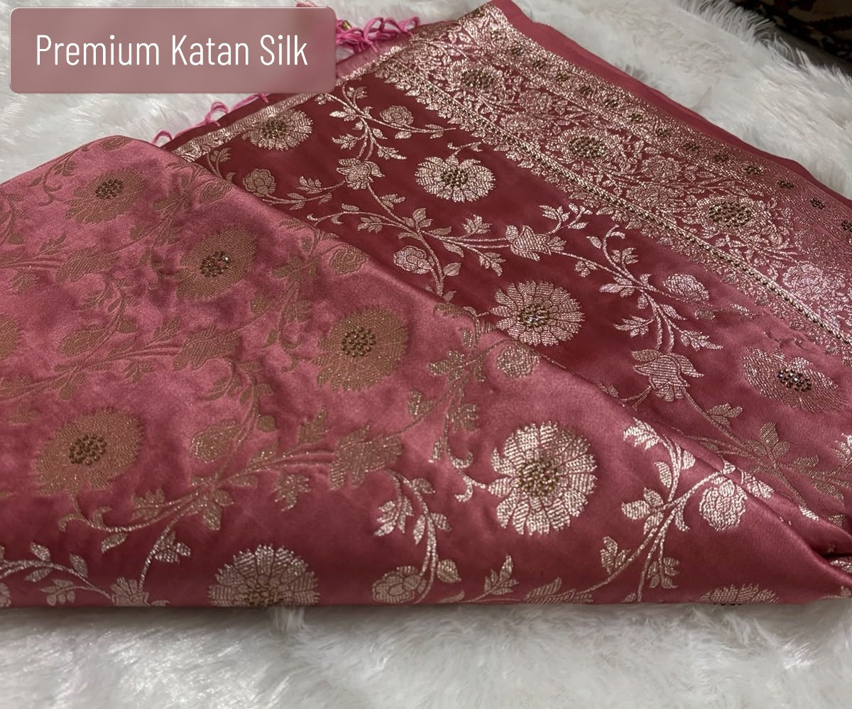 Rose pink Banarasi silk saree flat lay showing full silver zari jaal body and geometric pallu