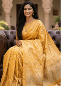Mustard gold silk saree with woven motifs and elegant festive look 