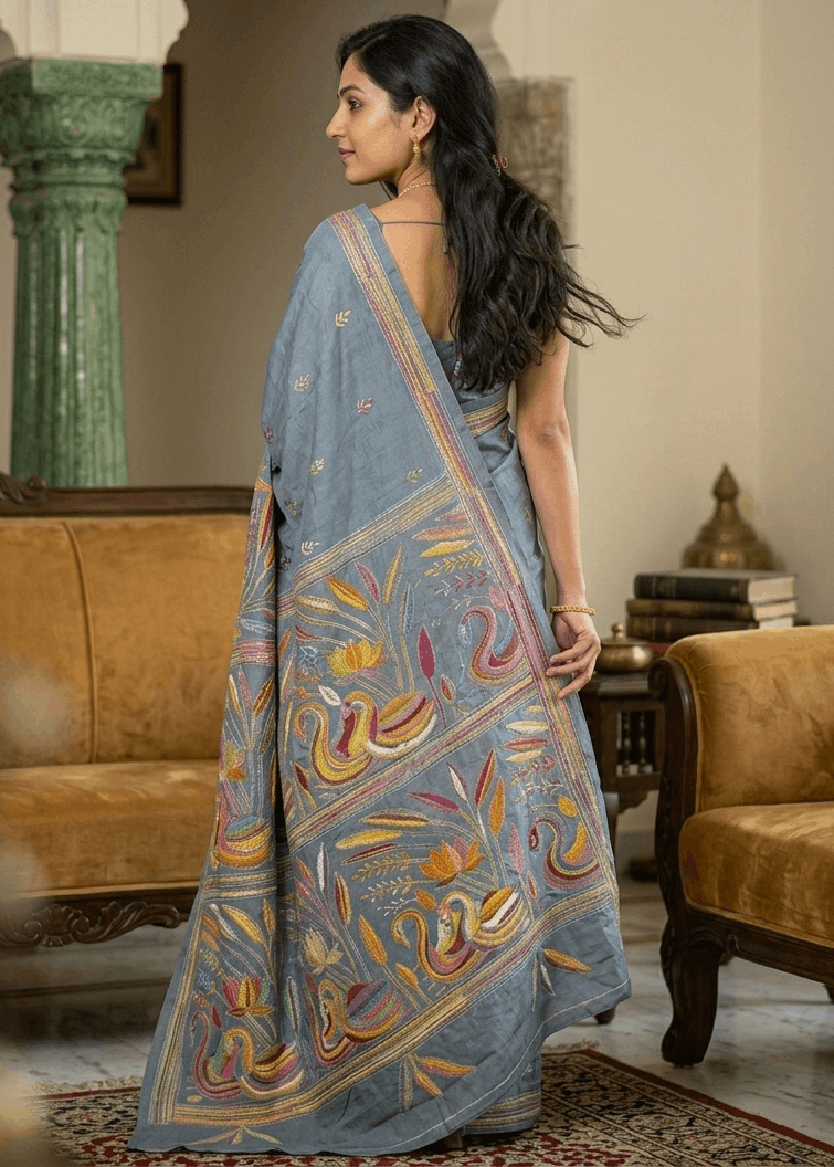 RangMayuri Kantha Stitch Saree in smoky grey cotton silk blend with vibrant multicolour handcrafted embroidery, artistic bird and floral motifs, and elegant Bengal handloom detailing perfect for festive and contemporary ethnic wear.