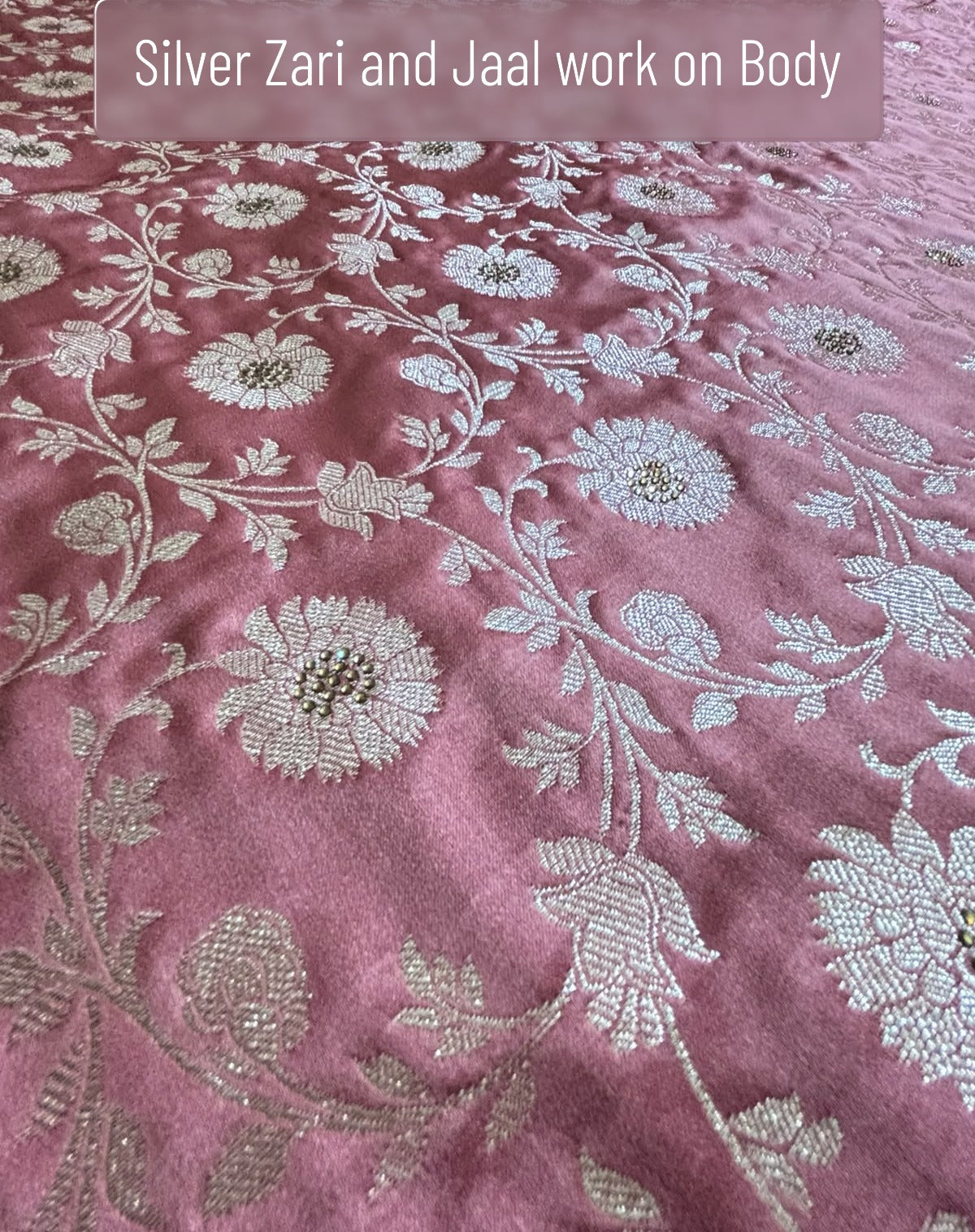 Geometric diamond-cut silver zari pallu design on rose pink pure silk Banarasi saree — festive look