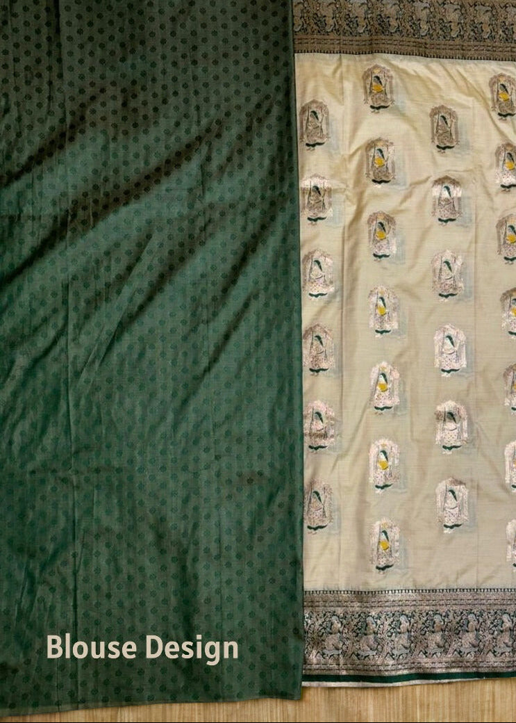 Green blouse for Beige color Baluchari saree with a patterned border and blouse design on a beige background