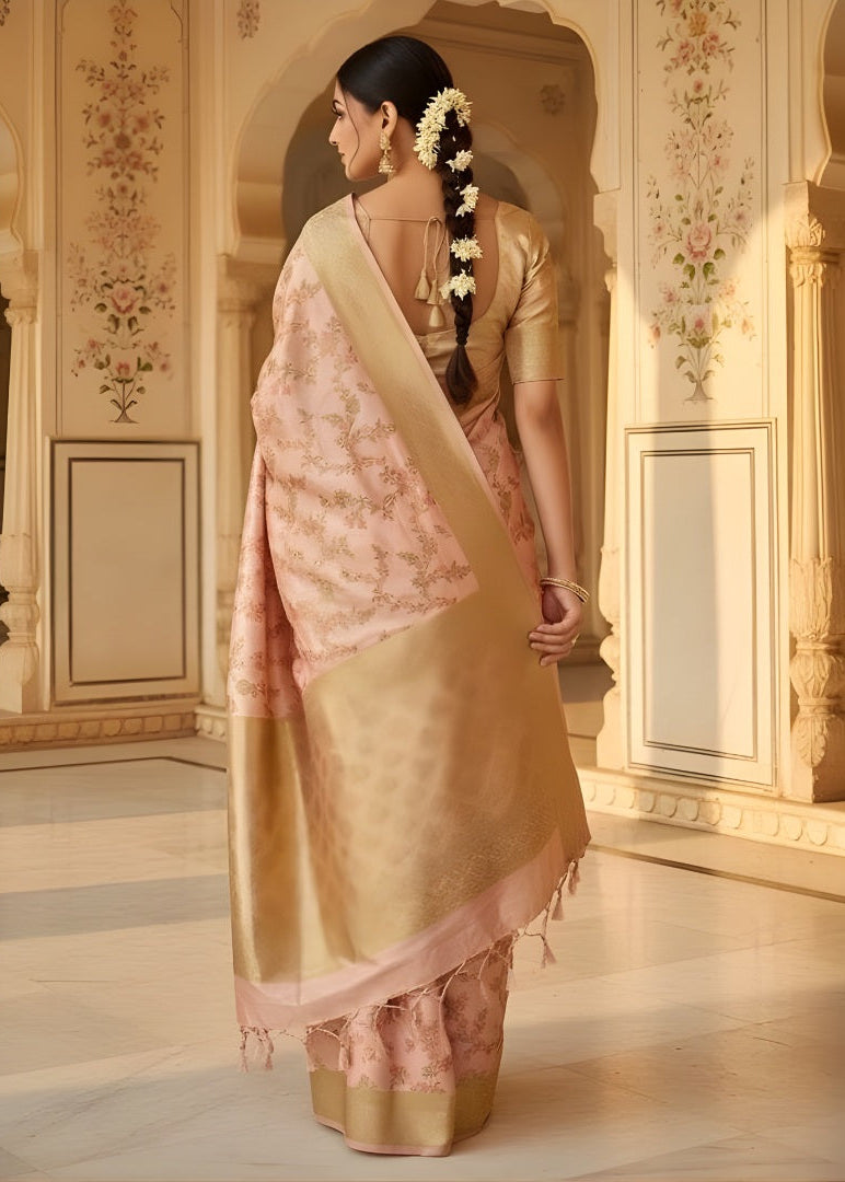 Woman in a traditional Banarasi saree standing in an ornate indoor setting