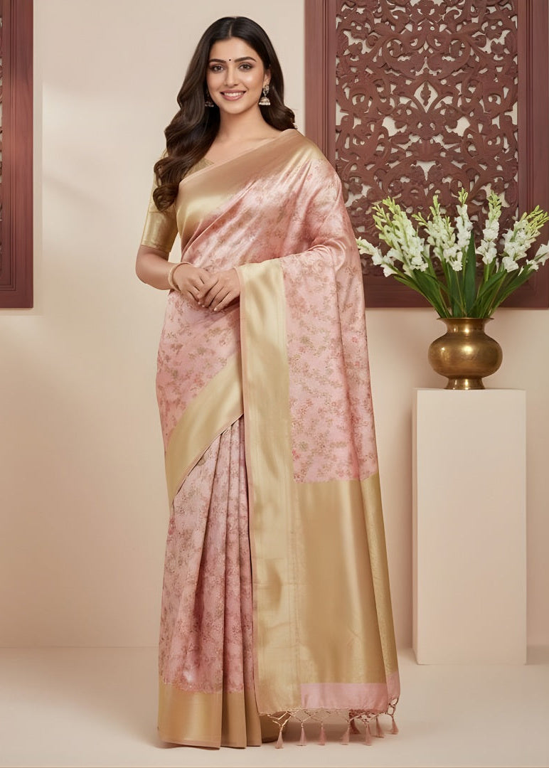 A woman wearing a pink Banarasi and gold saree with a decorative background